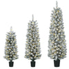 Snowy flocked white Christmas trees