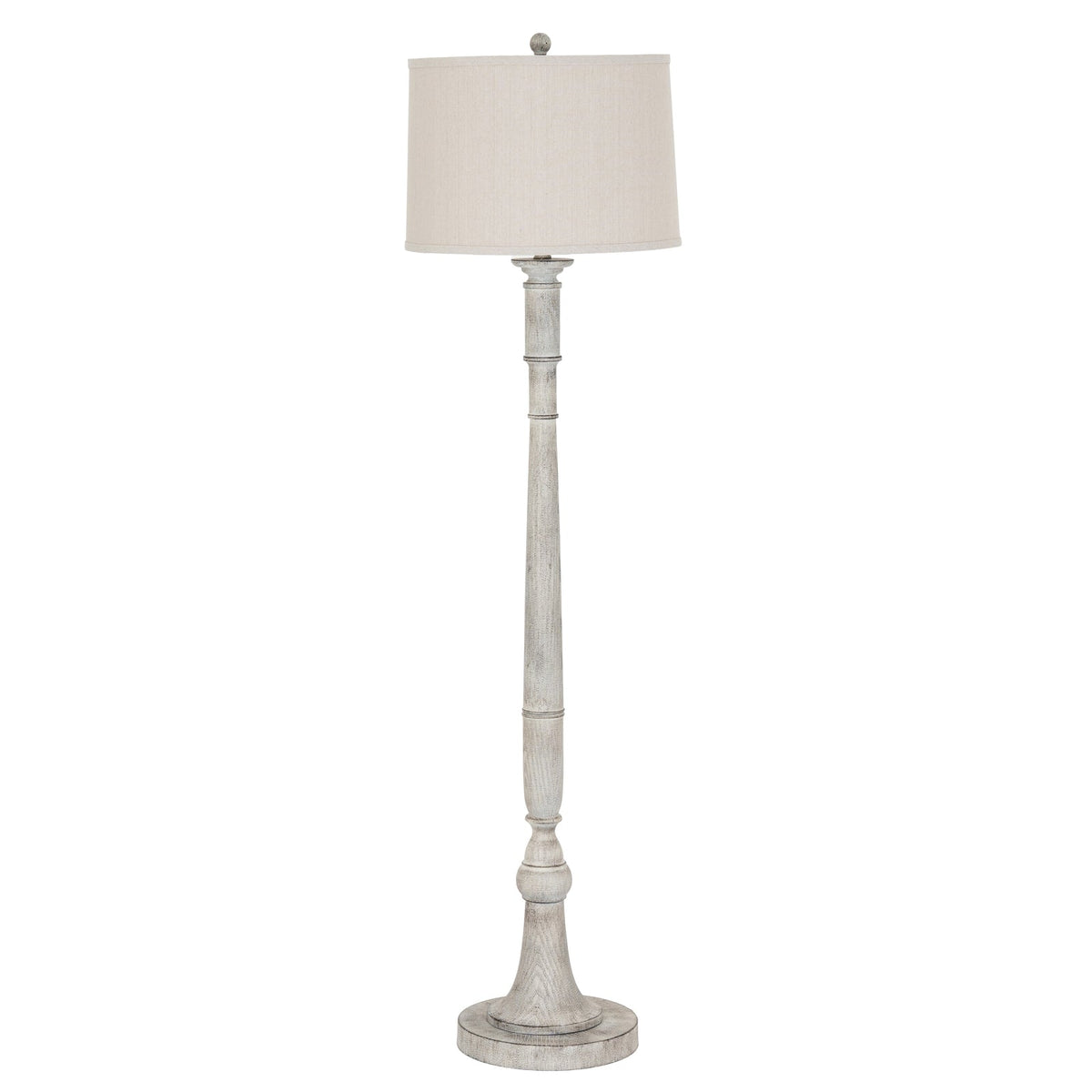 White sculpted resin floor lamp with a linen drum shade