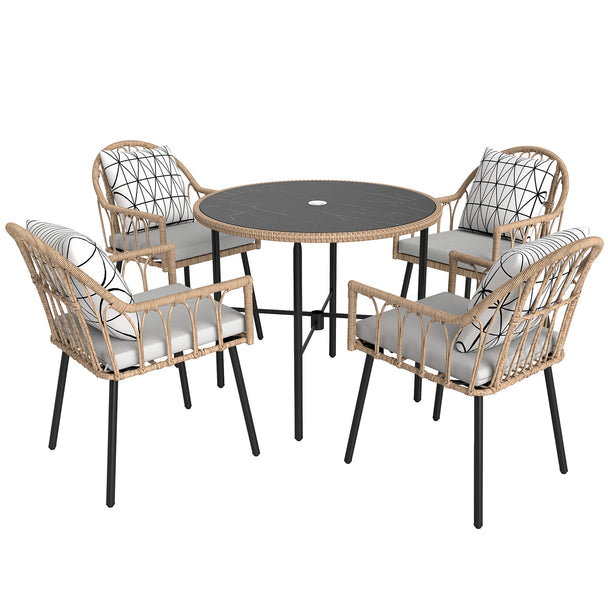 Light brown rattan dining set with four cushioned chairs and round stone-effect glass table