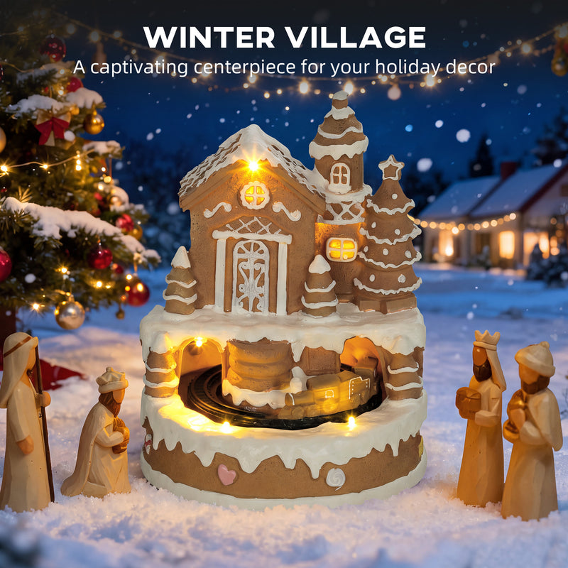 Gingerbread house Christmas village decoration glowing in a snowy festive display