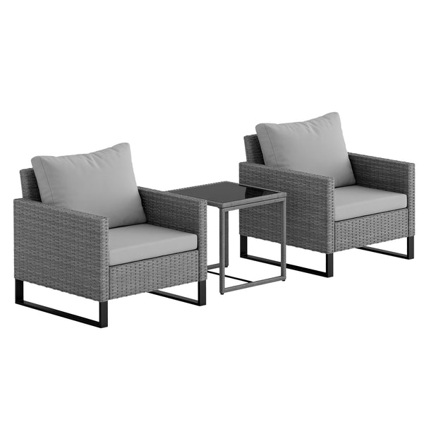 Light grey rattan bistro set with two deep cushioned armchairs and glass-top table