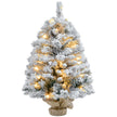 3ft snowy pre-lit tabletop Christmas tree with warm white LEDs in a linen-wrapped base