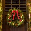 60cm Light-Up Christmas Wreath hanging in a festive room