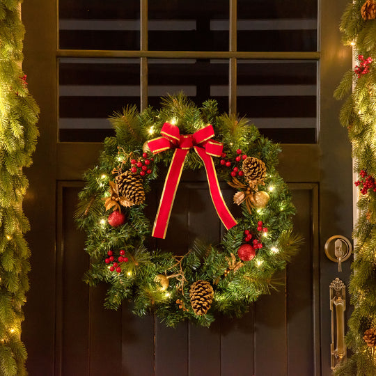 60cm Light-Up Christmas Wreath hanging in a festive room