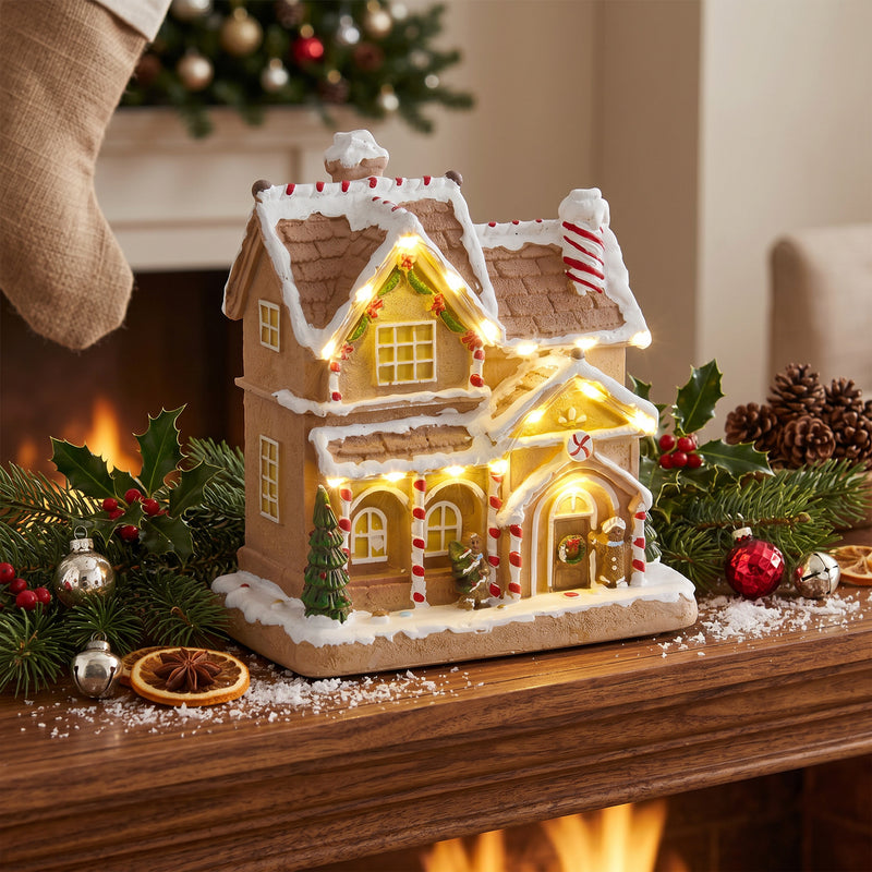 Gingerbread house on a mantelpiece