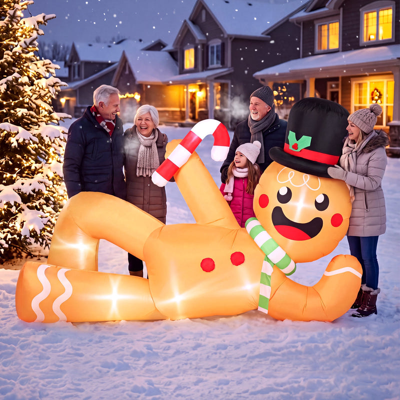 9.8ft Lying Gingerbread Man Christmas Inflatable displayed outside a decorated home