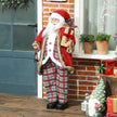 120cm Singing Santa beside a decorated Christmas tree