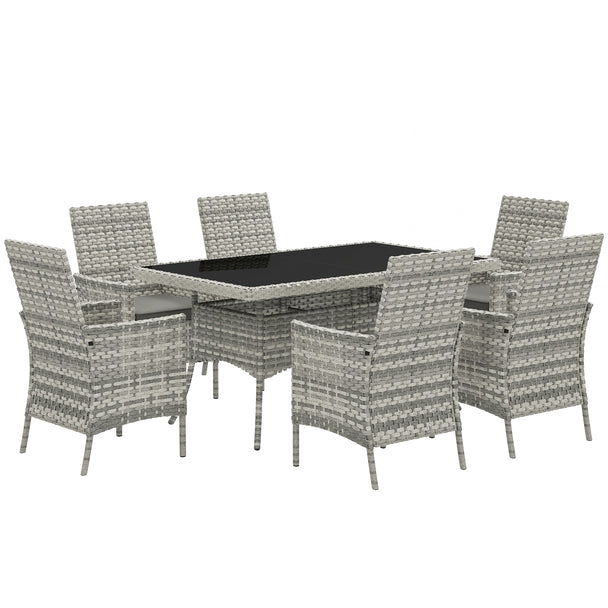 Mixed grey rattan dining set with six high-back cushioned chairs and long glass-top table