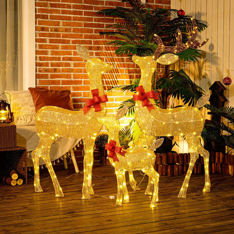 3-Piece Light-Up Reindeer Family illuminated in a room