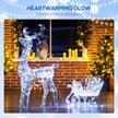 Silver Reindeer and Sleigh Christmas decoration shown in a festive display