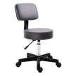 Grey padded salon stool with curved backrest, height-adjustable gas lift and five castor wheels