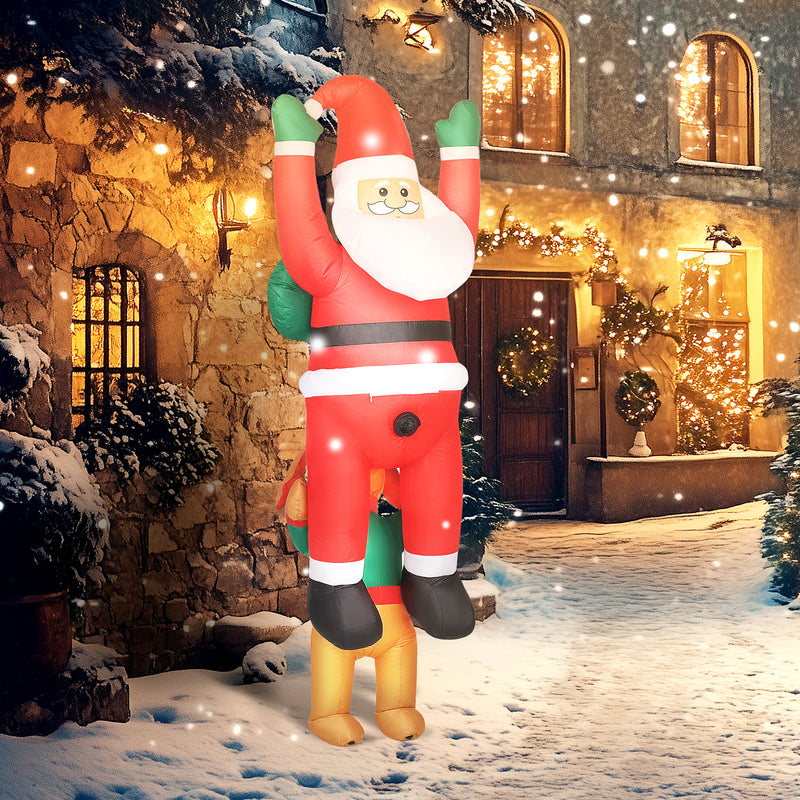 7ft Hanging Santa and Dog Christmas Inflatable in a festive outdoor setting