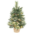 60 cm snow-flocked pre-lit tabletop Christmas tree with pine cones and a linen-look base