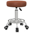 Brown round PU leather rolling stool with footrest and five castor wheels