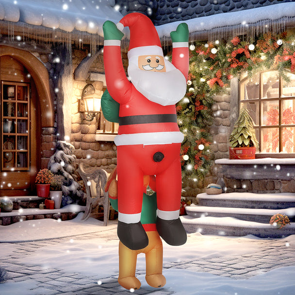 7ft Hanging Santa and Dog Christmas Inflatable displayed outside a decorated home