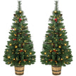 Pair of 4ft pre-lit pine Christmas trees in wooden barrel-style pots with pine cones and berries