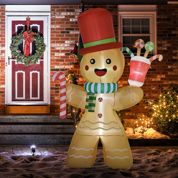 7.5ft Gingerbread Man Christmas Inflatable displayed outside a decorated home