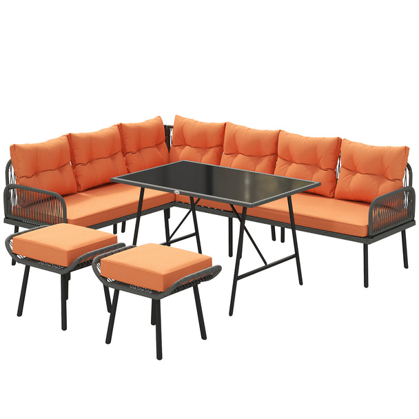 Charcoal rattan modular corner dining set with orange cushions, two stools and glass-top table