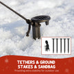 Ground stakes and tether ropes for securing the inflatable