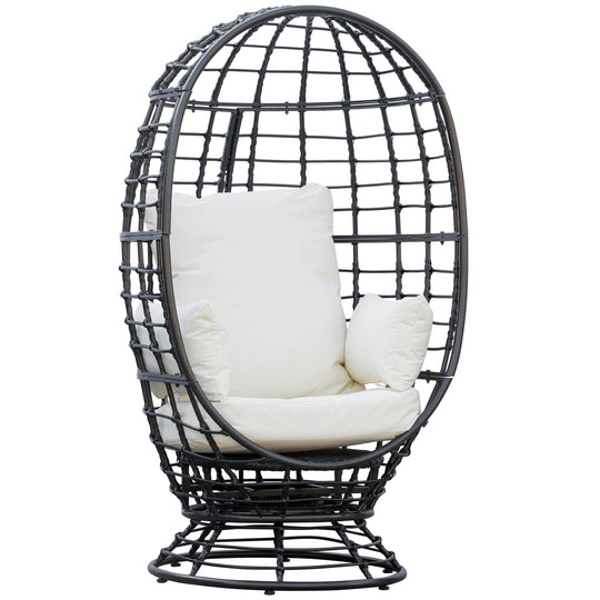 Black rattan 360° swivel egg chair with thick white cushion and pillows