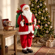 4ft Singing Santa beside a decorated Christmas tree