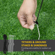 Ground stakes and tether ropes for securing the inflatable