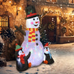 6ft Snowman and Penguins Christmas Inflatable in a festive outdoor setting
