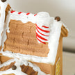 Close-up of the snowy gingerbread roof