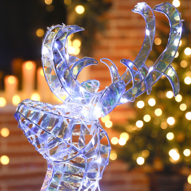 Silver Reindeer and Sleigh Christmas decoration illuminated in a room