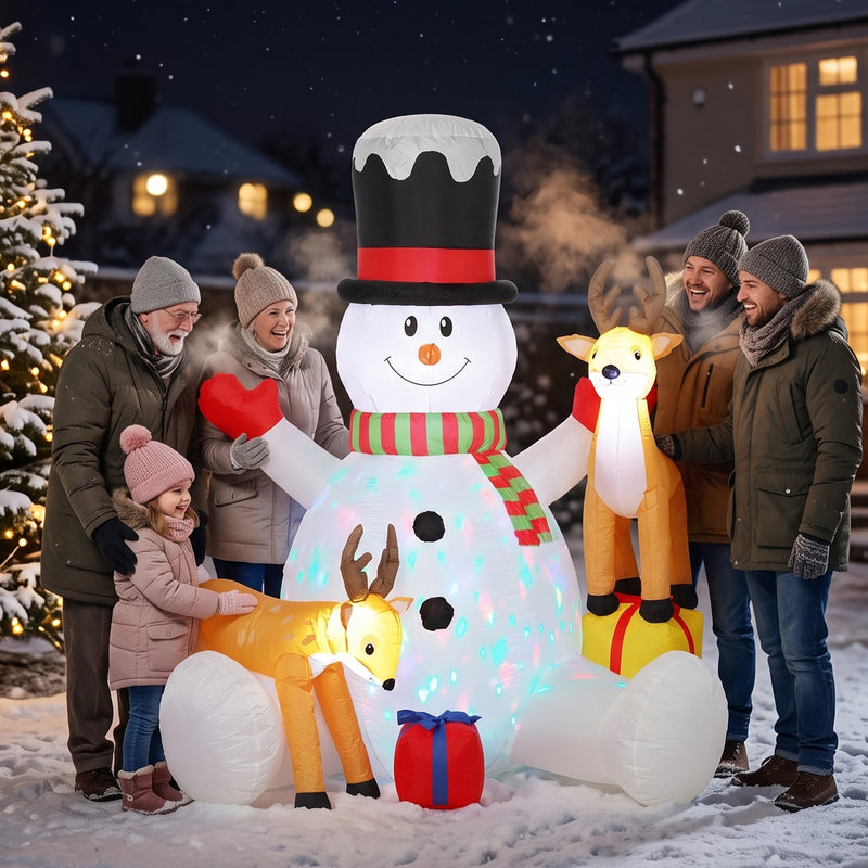 7ft Snowman and Reindeer Christmas Inflatable displayed outside a decorated home