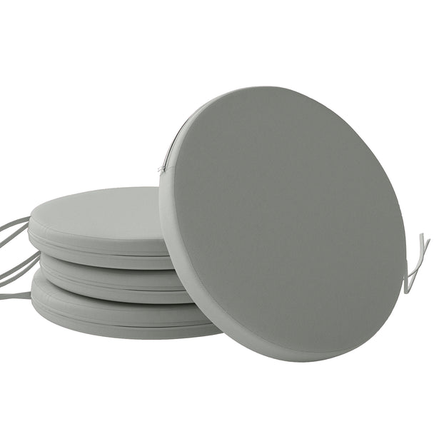 Four light grey round bistro chair cushions, 41 cm diameter, with ties on garden chairs