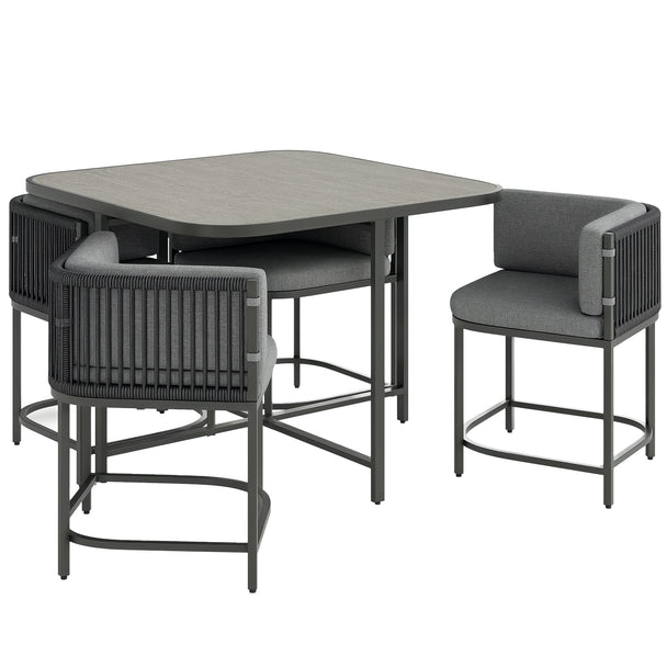 Charcoal grey rattan cube dining set with four chairs tucked under a square table