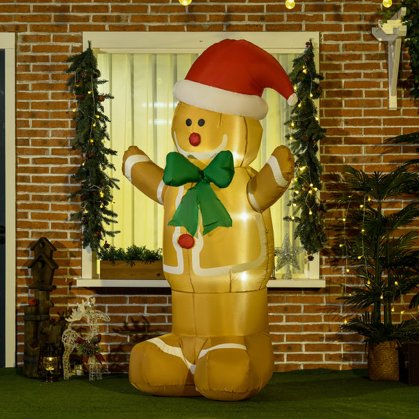 6ft Gingerbread Man in Santa Hat Christmas Inflatable displayed outside a decorated home