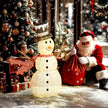 3ft Light-Up Snowman Christmas decoration illuminated outside a decorated home