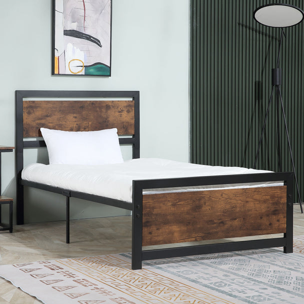 Single metal bed frame with rustic brown wood-effect headboard, black steel frame and underbed space