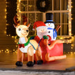 6.5ft Santa Sleigh and Reindeer Christmas Inflatable displayed outside a decorated home