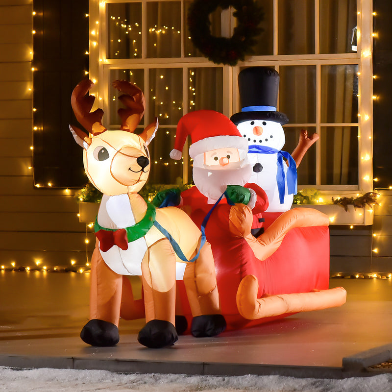 6.5ft Santa Sleigh and Reindeer Christmas Inflatable displayed outside a decorated home
