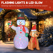 Illuminated 6ft snowman and dog Christmas inflatable at night