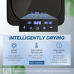 Compact tumble dryer in black – image 4