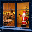 Illustrative Christmas scene with several inflatable decorations