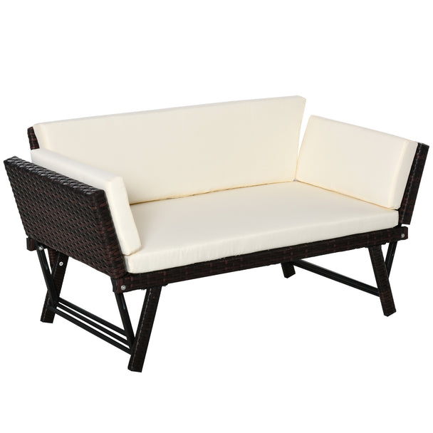 Brown rattan 2-in-1 sofa daybed with cream cushions and fold-down arms