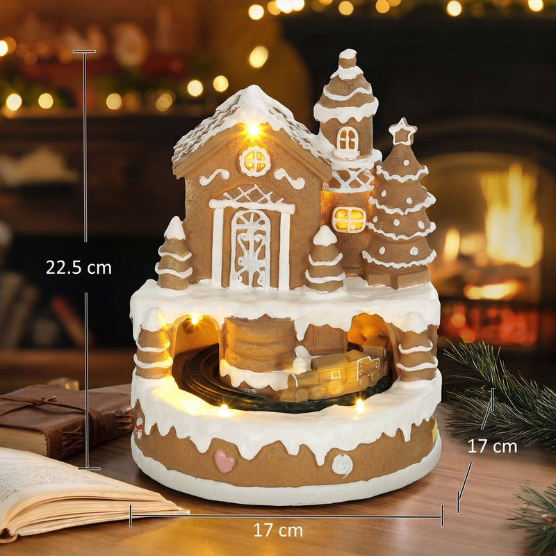 Musical gingerbread house with dimensions shown: 17 cm wide, 17 cm deep and 22.5 cm high