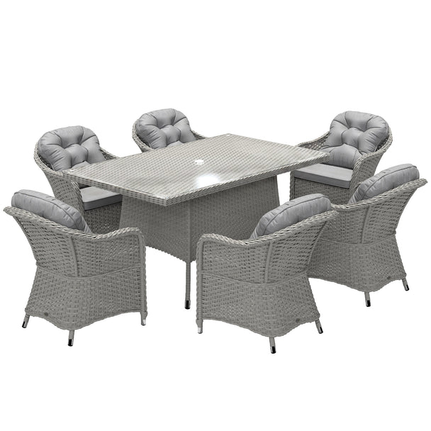 Light grey 7-piece rattan dining set with six cushioned chairs and glass-top table with parasol hole