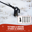 Ground stakes and tether ropes for securing the inflatable