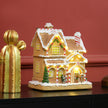 Gingerbread house Christmas decoration on a shelf