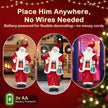 Santa figure displayed beside a Christmas tree