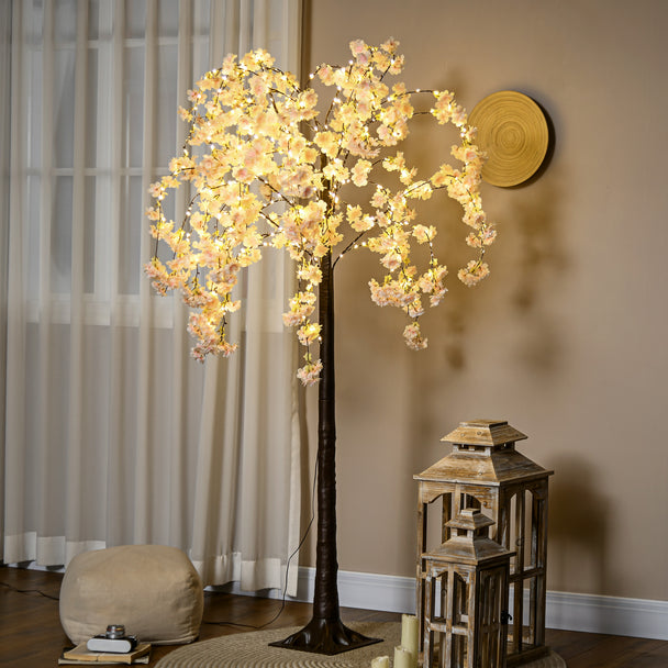 Artificial Pink Blossom Tree illuminated in a room