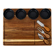 Acacia cheese board set with four black bowls and three knives, top view
