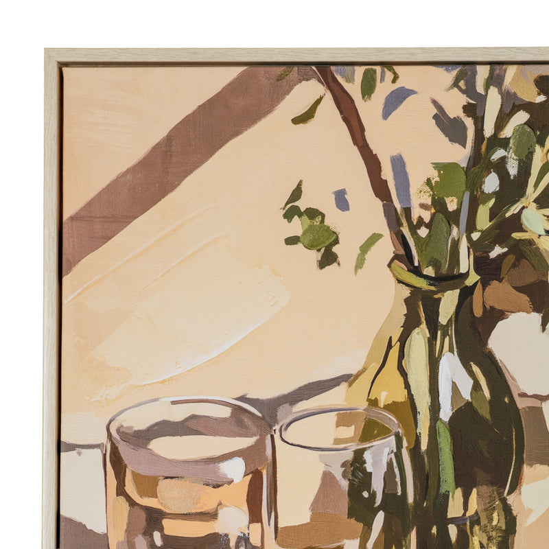Close-up of the painted vase of green stems and glasses