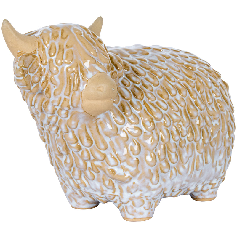 Highland cow ornament from the front showing its fringe and horns